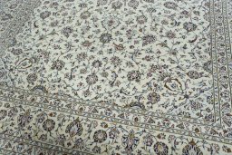 Close-up detail of 2000s Kashan rug from Iran / Persia showing Wool weave