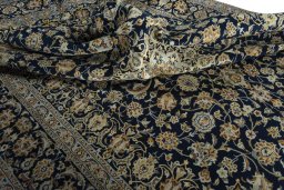 Surface texture of 2000s Kashan rug with natural Wool and intricate pattern
