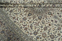 Close-up detail of 2000s Kashan rug from Iran / Persia showing Wool weave