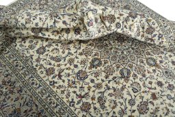 Surface texture of 2000s Kashan rug with natural Wool and intricate pattern