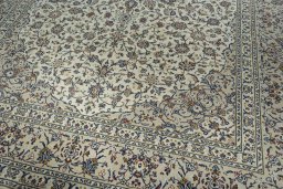 Close-up detail of 2000s Kashan rug from Iran / Persia showing Wool weave