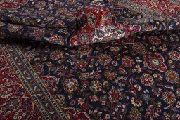 Surface texture of 2000s Kashan rug with natural Wool and intricate pattern