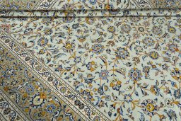 Close-up detail of 2000s Kashan rug from Iran / Persia showing Wool weave