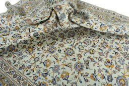 Surface texture of 2000s Kashan rug with natural Wool and intricate pattern