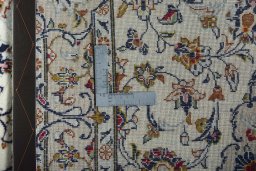 Surface texture of New Kashan rug with natural Wool and intricate pattern