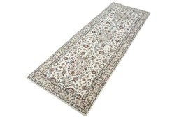 Corner detail of New Kashan rug showing border pattern and Wool pile