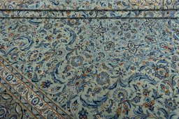 Close-up detail of 2000s Kashan rug from Iran / Persia showing Wool weave