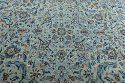 Central medallion detail of 2000s Kashan rug from Iran / Persia