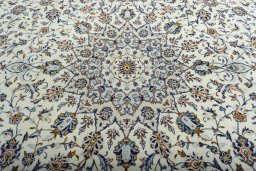 Central medallion detail of 2000s Kashan rug from Iran / Persia