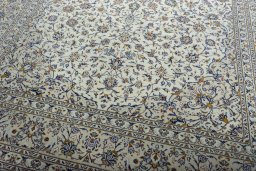 Close-up detail of 2000s Kashan rug from Iran / Persia showing Wool weave