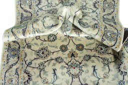 Close-up detail of 2000s Kashan rug from Iran / Persia showing Wool weave