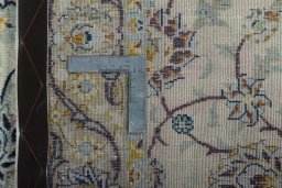 Surface texture of 2000s Kashan rug with natural Wool and intricate pattern
