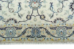 Close-up detail of 2000s Kashan rug from Iran / Persia showing Wool weave