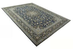 Close-up detail of 2000s Kashan rug from Iran / Persia showing Wool weave