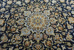 Central medallion detail of 2000s Kashan rug from Iran / Persia