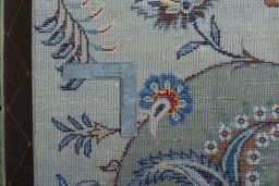 Backside of handmade 2000s Kashan rug showing knot structure and weave density