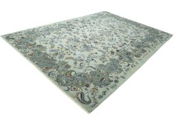 Corner detail of 2000s Kashan rug showing border pattern and Wool pile