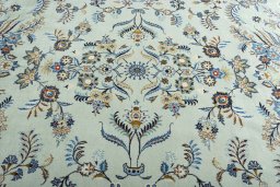 Central medallion detail of 2000s Kashan rug from Iran / Persia