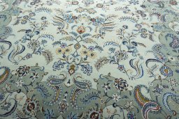 Close-up detail of 2000s Kashan rug from Iran / Persia showing Wool weave