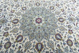 Central medallion detail of 2000s Kashan rug from Iran / Persia