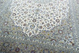 Close-up detail of 2000s Kashan rug from Iran / Persia showing Wool weave