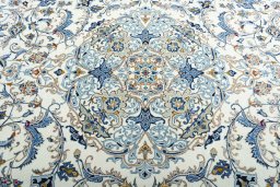 Central medallion detail of 2000s Kashan rug from Iran / Persia