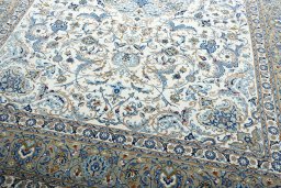 Close-up detail of 2000s Kashan rug from Iran / Persia showing Wool weave