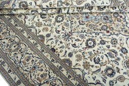 Close-up detail of 2000s Kashan rug from Iran / Persia showing Wool weave