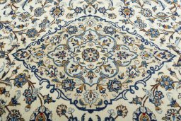 Central medallion detail of 2000s Kashan rug from Iran / Persia