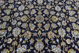 Central medallion detail of 2000s Kashan rug from Iran / Persia