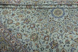 Close-up detail of 2000s Kashan rug from Iran / Persia showing Wool weave