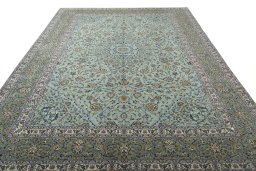 Surface texture of 2000s Kashan rug with natural Wool and intricate pattern