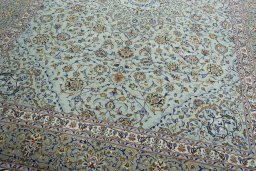 Close-up detail of 2000s Kashan rug from Iran / Persia showing Wool weave
