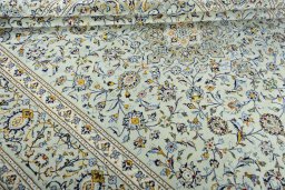 Close-up detail of 2000s Kashan rug from Iran / Persia showing Wool weave