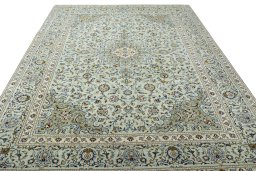 Surface texture of 2000s Kashan rug with natural Wool and intricate pattern