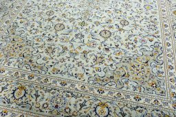 Close-up detail of 2000s Kashan rug from Iran / Persia showing Wool weave