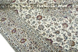 Close-up detail of 2000s Kashan rug from Iran / Persia showing Wool weave