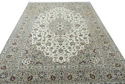 Surface texture of 2000s Kashan rug with natural Wool and intricate pattern