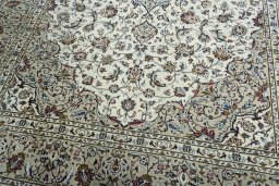 Close-up detail of 2000s Kashan rug from Iran / Persia showing Wool weave