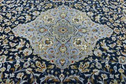 Central medallion detail of 2000s Kashan rug from Iran / Persia