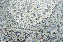 Close-up detail of New Kashan rug from Iran / Persia showing Wool weave