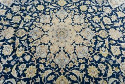 Central medallion detail of 2000s Kashan rug from Iran / Persia