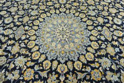 Central medallion detail of 2000s Kashan rug from Iran / Persia