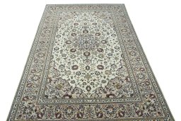 Surface texture of 2000s Kashan rug with natural Wool and intricate pattern