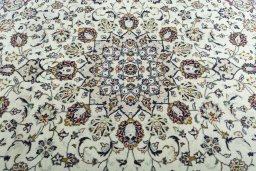 Central medallion detail of 2000s Kashan rug from Iran / Persia