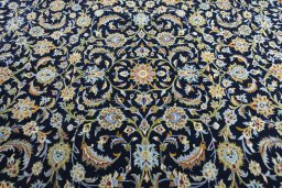 Central medallion detail of 2000s Kashan rug from Iran / Persia