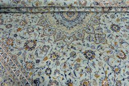 Close-up detail of 2000s Kashan rug from Iran / Persia showing Wool weave