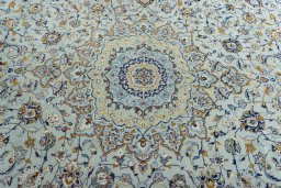 Central medallion detail of 2000s Kashan rug from Iran / Persia