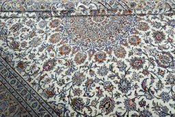 Close-up detail of 2000s Kashan rug from Iran / Persia showing Wool weave