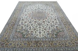 Surface texture of 2000s Kashan rug with natural Wool and intricate pattern